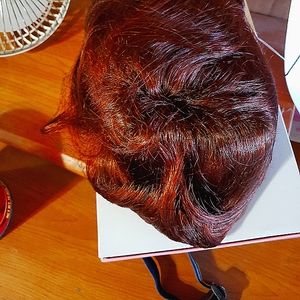 Brand new still in the box mid length synthetic wigs .various colors and styles